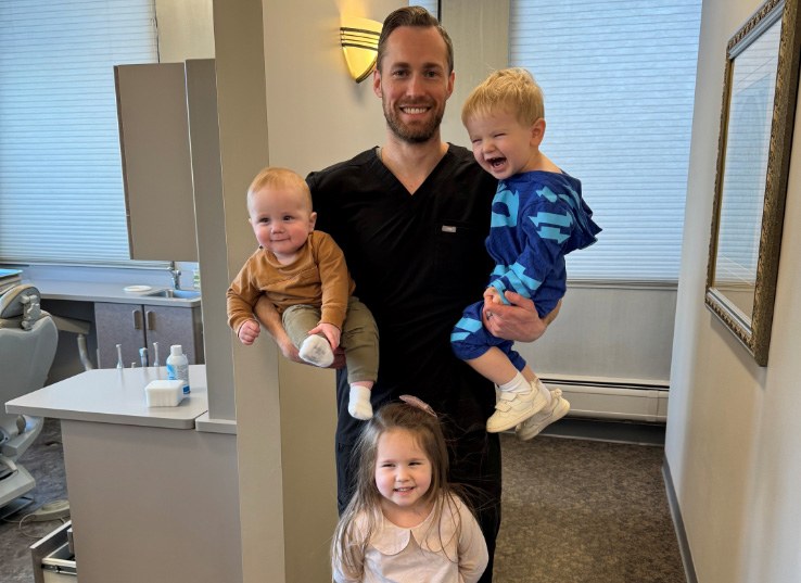 smiling Dr. Jeffrey Seredynski & his family